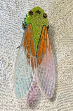 Lazer Unicorn Cicada brooch.  Faulty