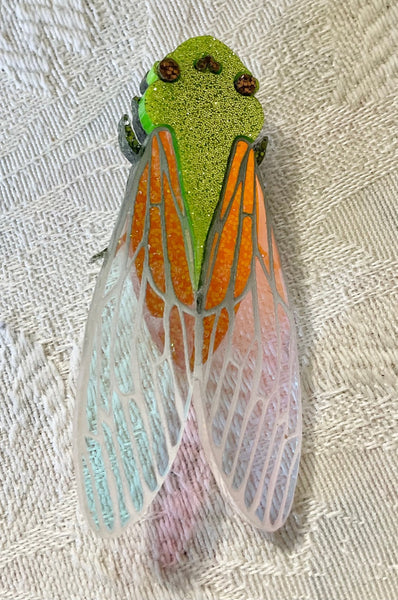 Lazer Unicorn Cicada brooch.  Faulty