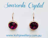 Swarovski Crystal round ‘Amethyst’ earrings - rose gold plated