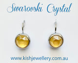 Swarovski Crystal round ‘Buttercup Yellow Lacquer’ earrings - rhodium plated