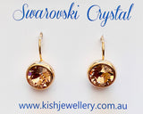 Swarovski Crystal round 'Light Colorado Topaz' earrings - gold  plated