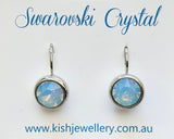 Swarovski Crystal round ‘Air Blue Opal’ earrings - rhodium plated
