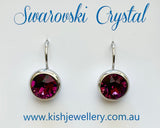 Swarovski Crystal round ‘Amethyst’ earrings - rhodium plated
