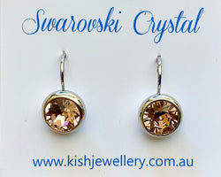 Swarovski Crystal round 'Light Colorado Topaz' earrings - rhodium plated