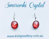 Swarovski Crystal oval 'Light Coral Lacquer' earrings - rhodium plated