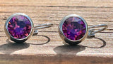 Swarovski Crystal round ‘Amethyst’ earrings - rhodium plated