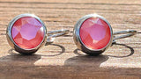 Swarovski Crystal round ‘Light Coral Lacquer’ earrings - rhodium plated
