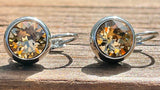 Swarovski Crystal round 'Light Colorado Topaz' earrings - rhodium plated